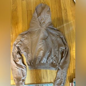 Cropped cinch waist sweatshirt